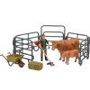 Farmár s krovinorezom a hnedá krava s teliatkom - ZooLandia